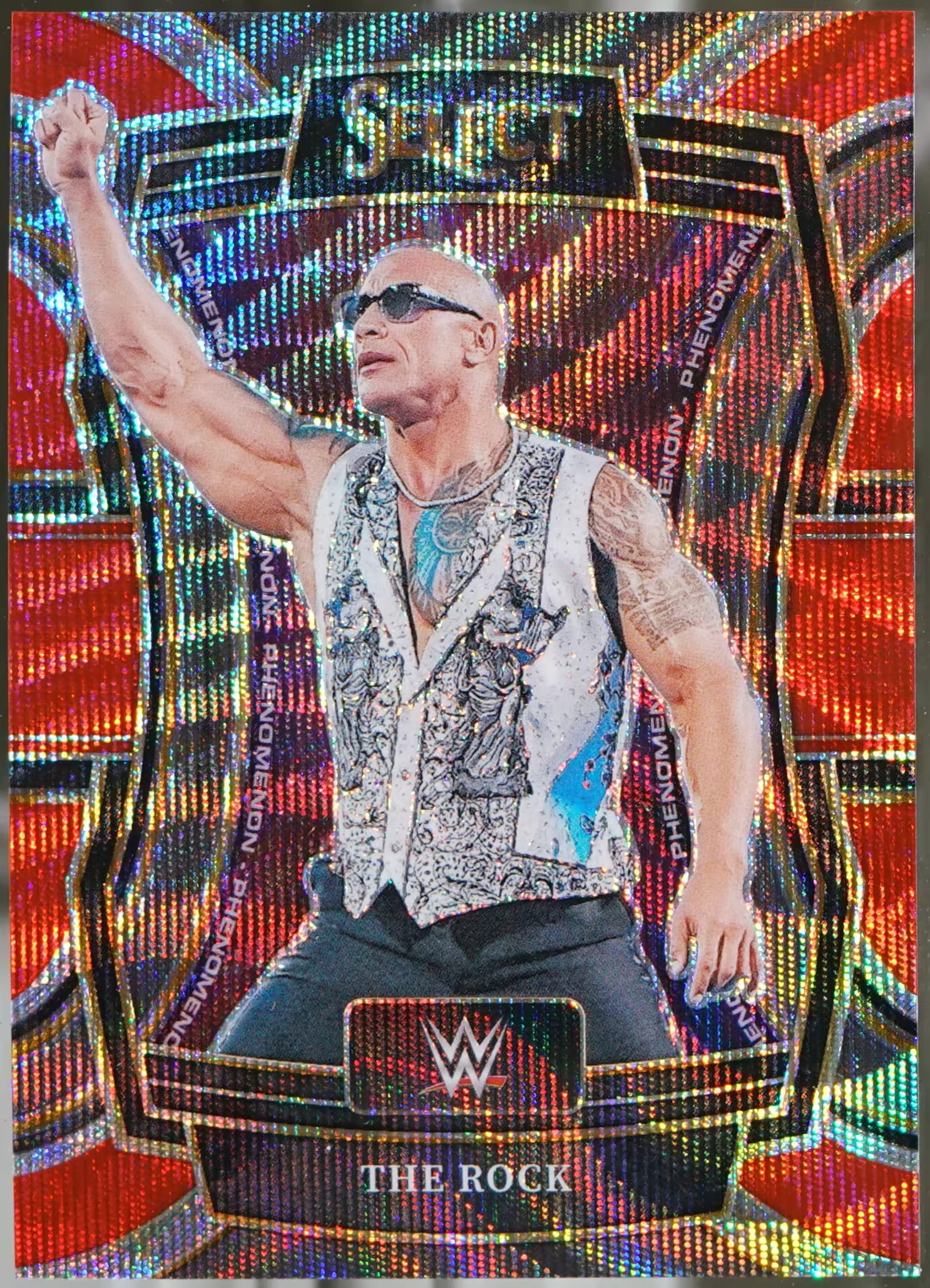 2024 Panini Select WWE – Phenomenon Red Wave Prizms #26 The Rock /149 NM
